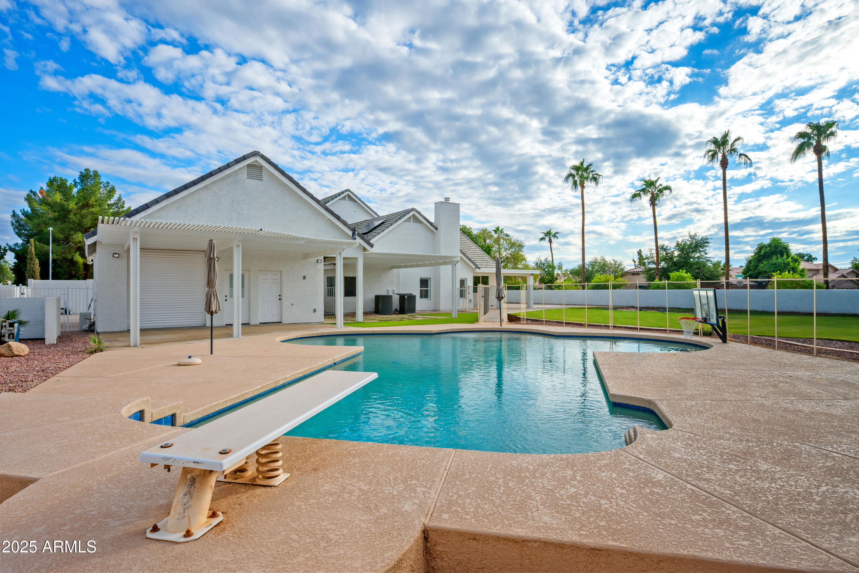 4352 East Santa Rosa Place Gilbert, AZ 85234 - Photo 52 of 53 a view of a house with swimming pool and sitting area