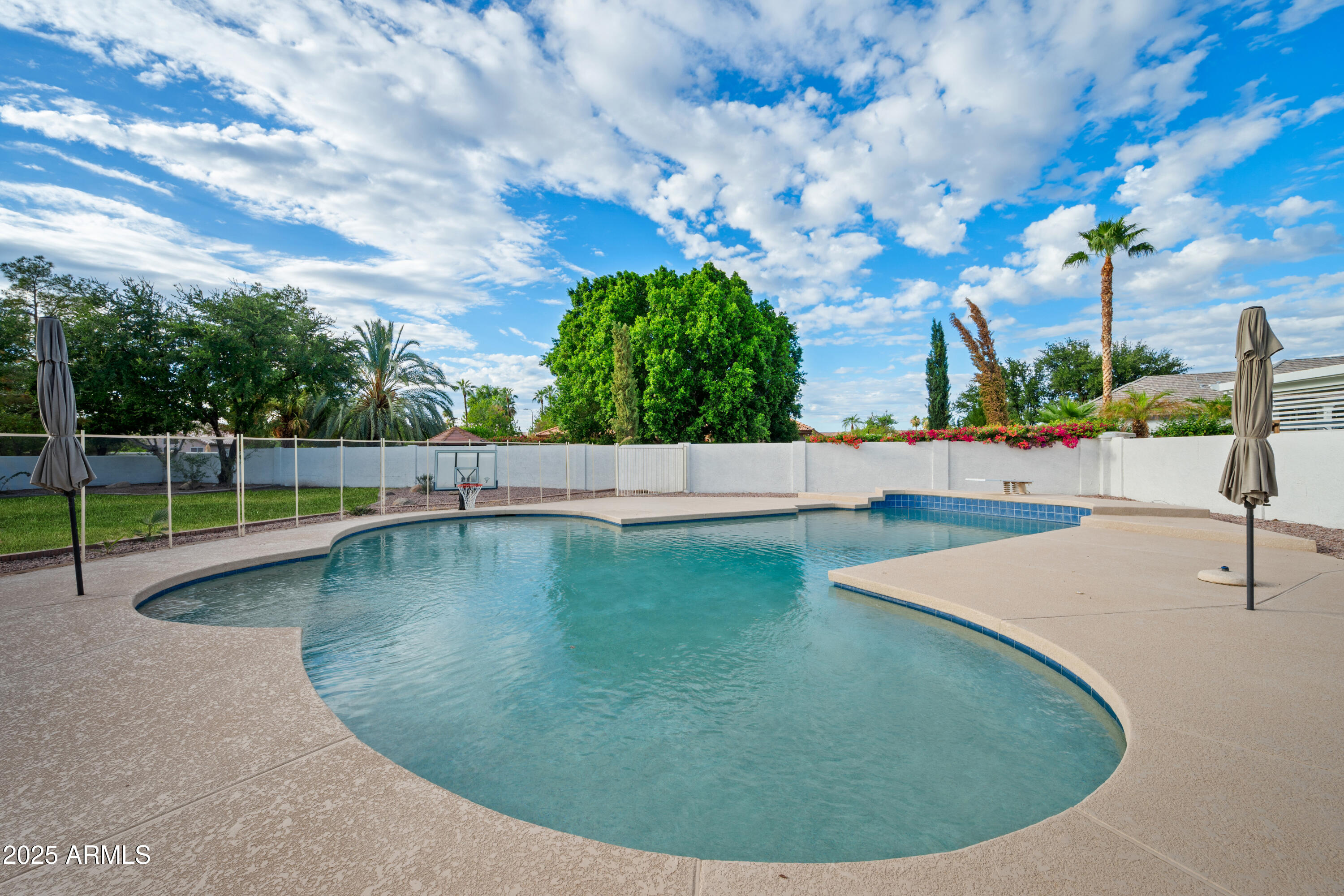 4352 East Santa Rosa Place Gilbert, AZ 85234 - Photo 53 of 53 a view of a swimming pool with a terrace