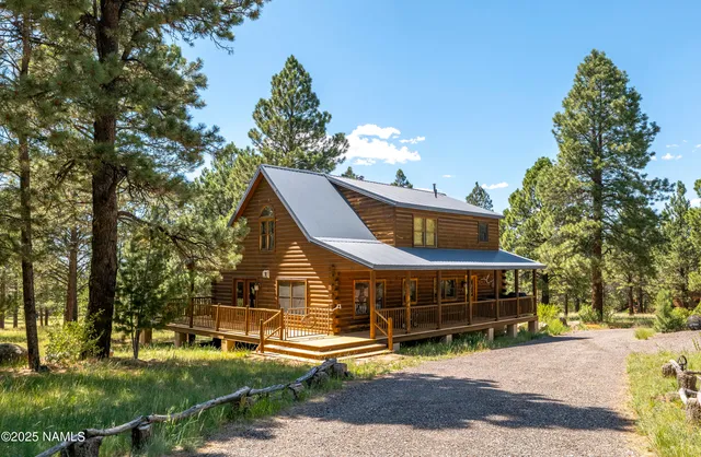 a view of balcony with wooden floor