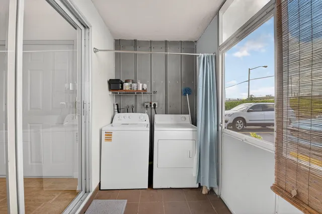 a storage room with washer and dryer