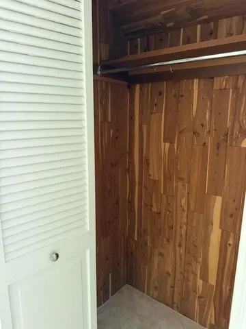 a bathroom with a sink toilet and mirror