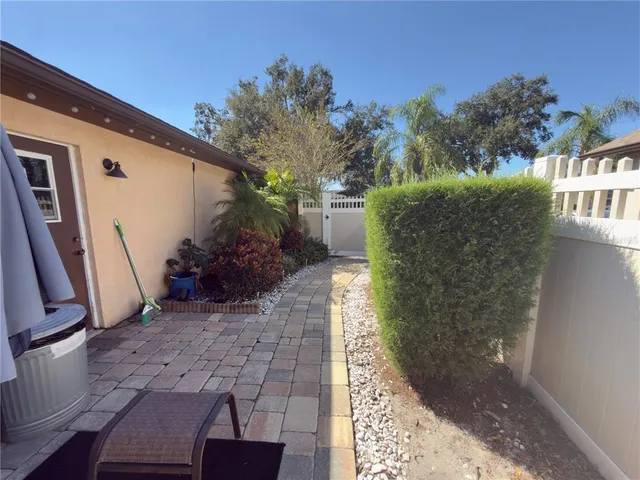 a view of a back yard of the house