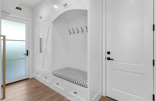 a living room with fireplace furniture and a flat screen tv