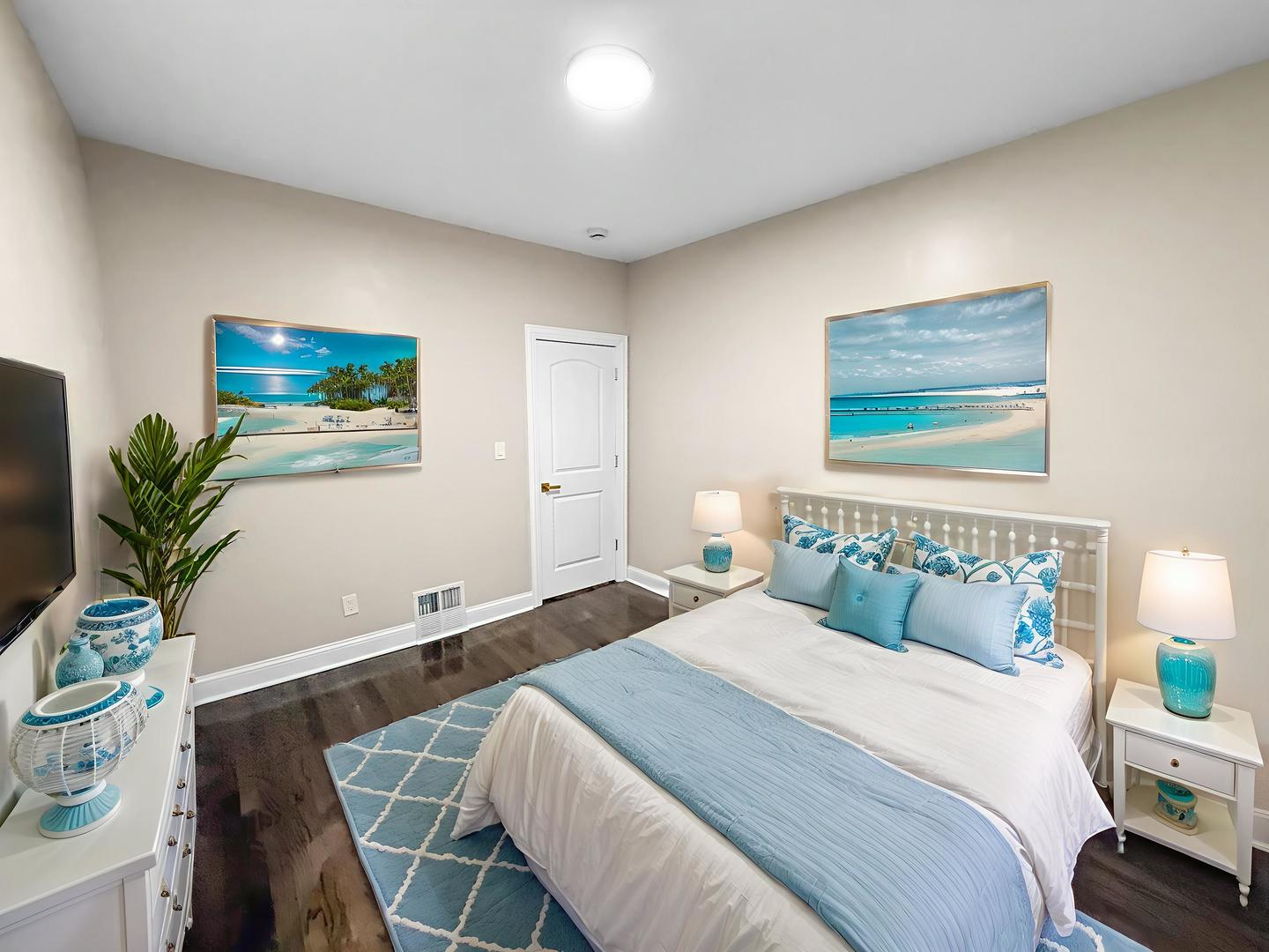 2914 Ridge Road Lansing, IL 60438 - Photo 16 of 32 a bedroom with a bed and a potted plant