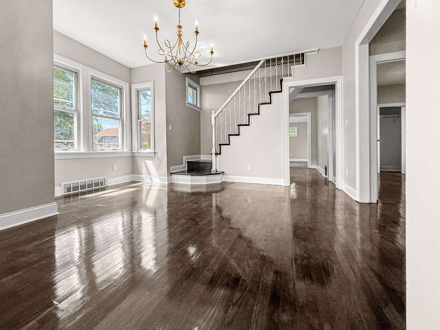 2914 Ridge Road Lansing, IL 60438 - Photo 7 of 32 a view of empty room with wooden floor and fan