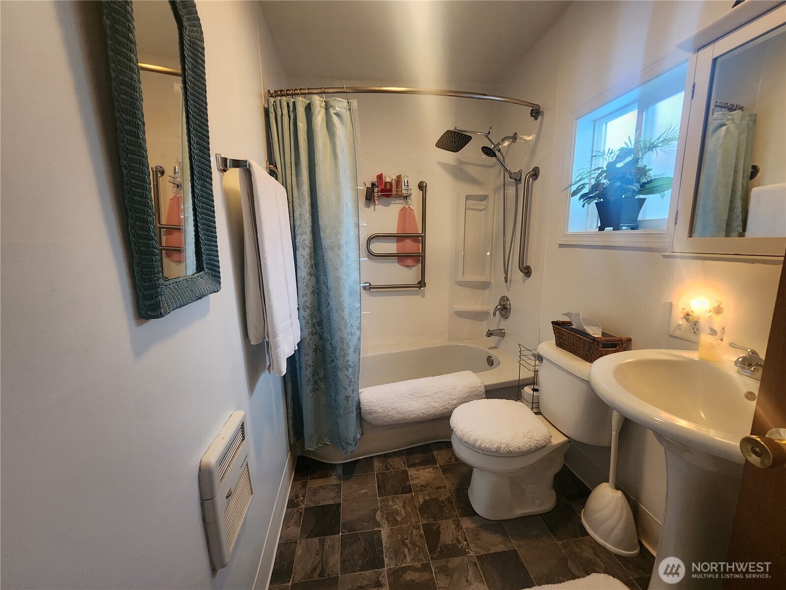 117 J Street Cosmopolis, WA 98537 - Photo 16 of 30 a bathroom with a sink toilet and shower