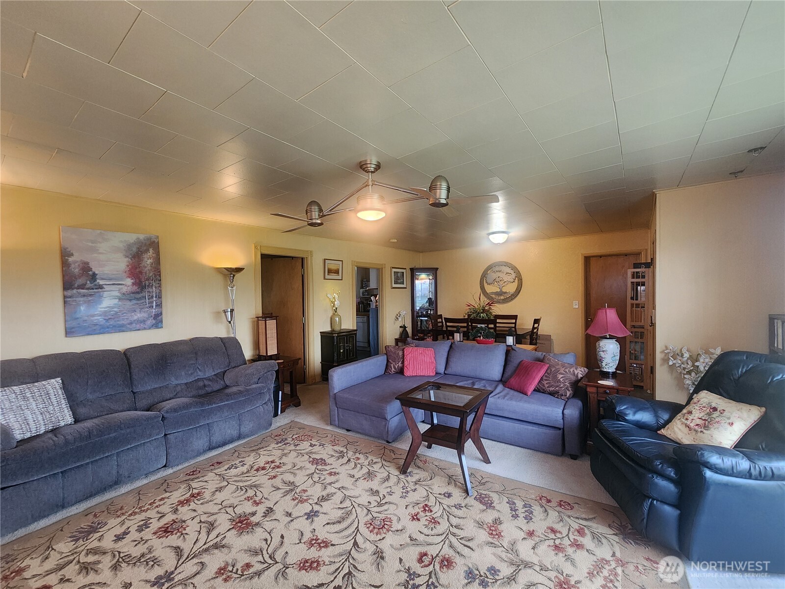 117 J Street Cosmopolis, WA 98537 - Photo 10 of 30 a living room with furniture a rug and a table