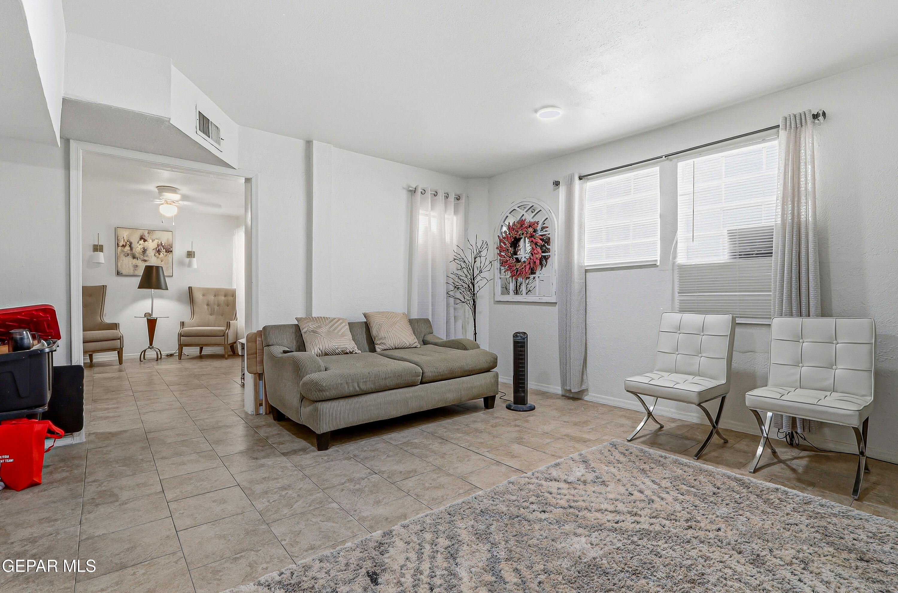 11548 Jenny Road Socorro, TX 79927 - Photo 21 of 39 a living room with furniture and a large window