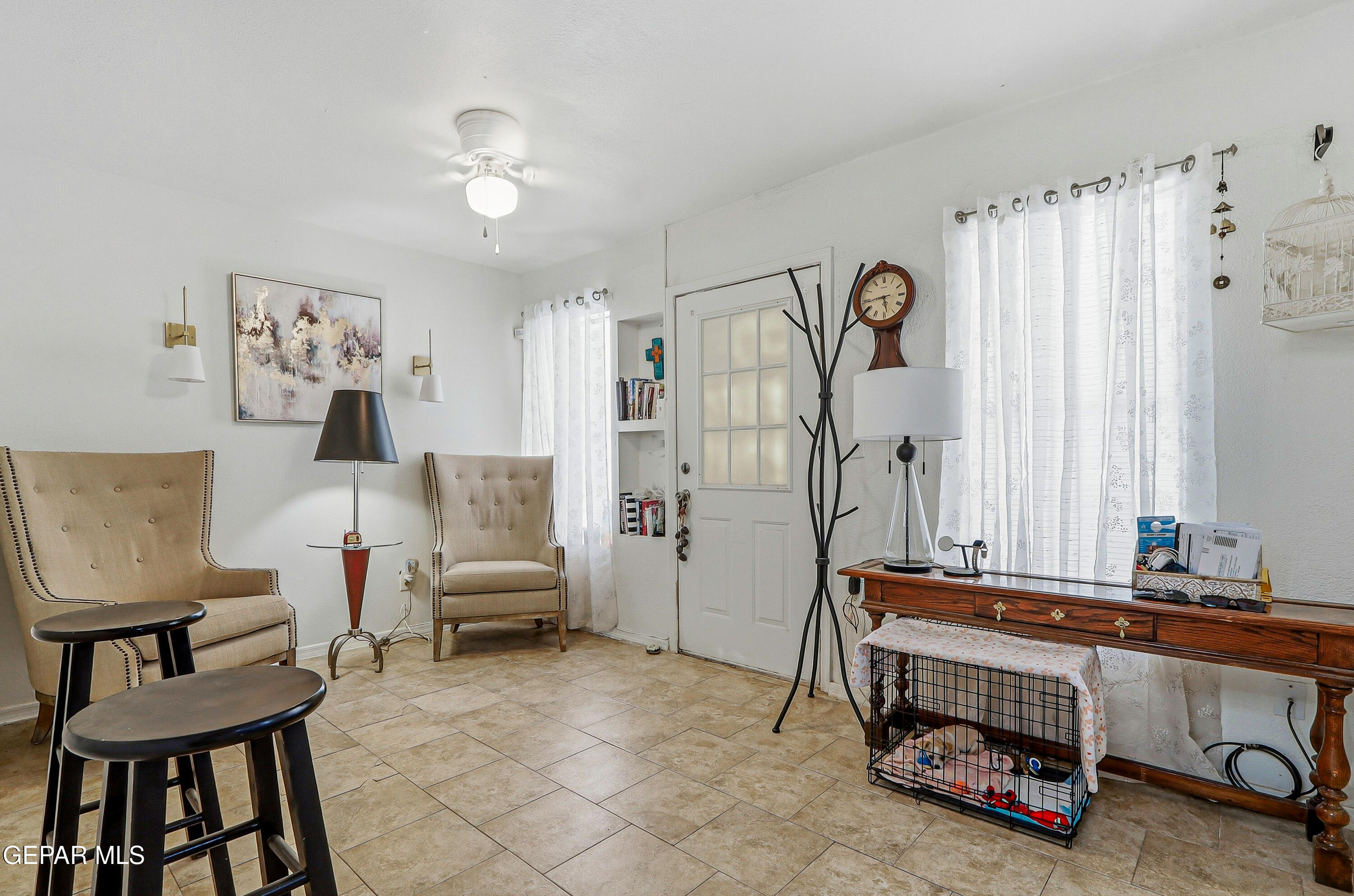 11548 Jenny Road Socorro, TX 79927 - Photo 24 of 39 a room with furniture and a window