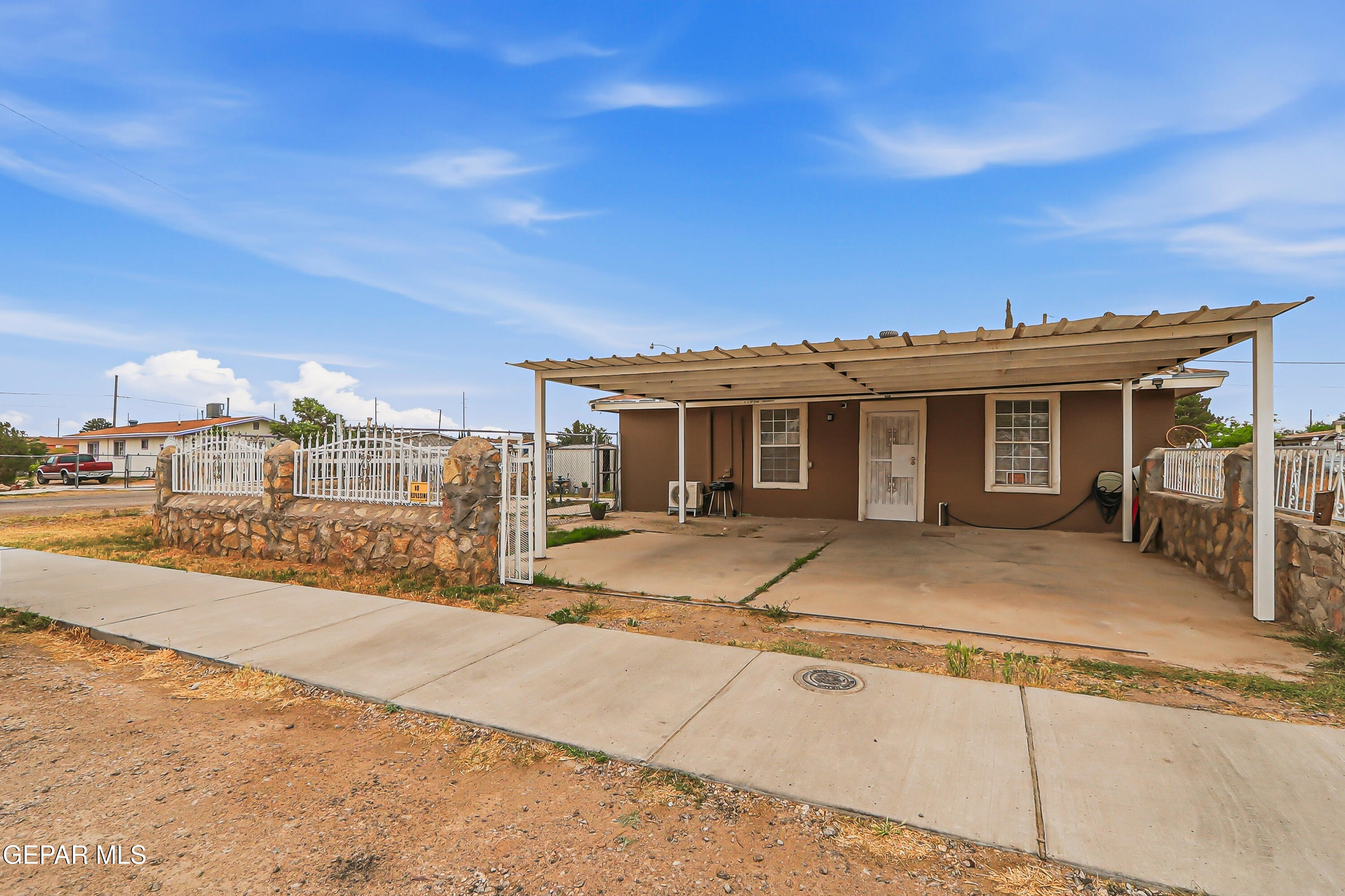 11548 Jenny Road Socorro, TX 79927 - Photo 3 of 39 a view of a house with a patio