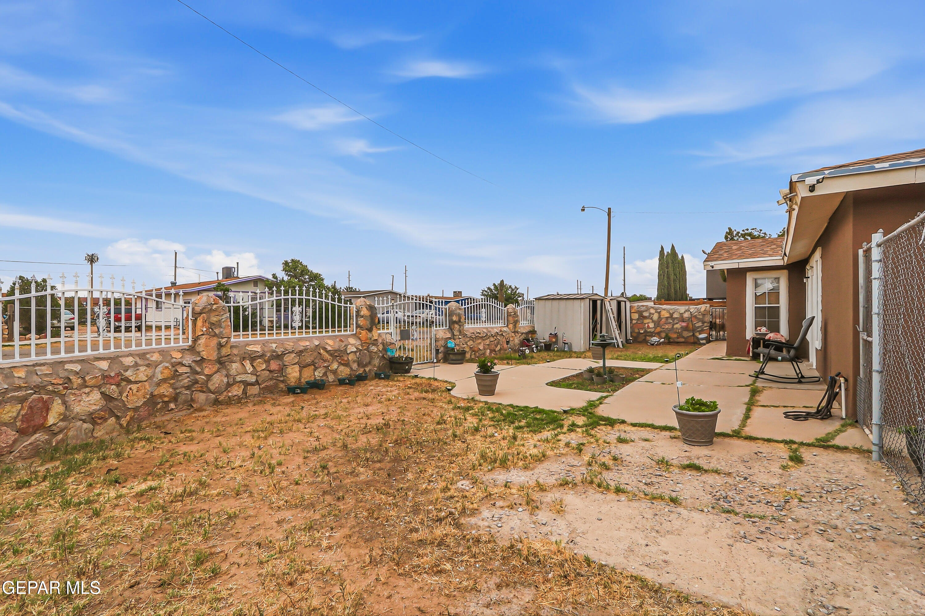11548 Jenny Road Socorro, TX 79927 - Photo 37 of 39 a view of a house with a patio
