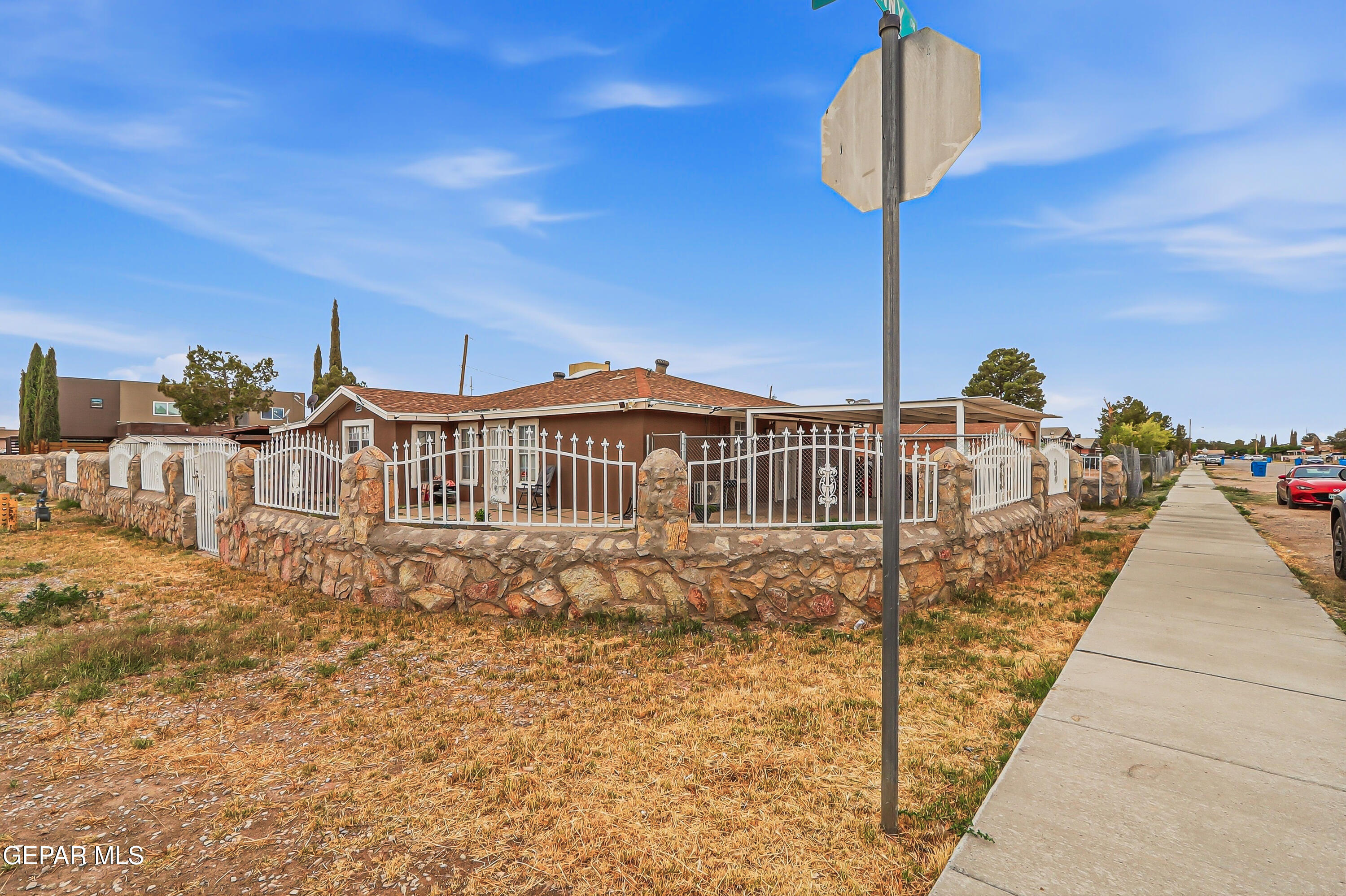 11548 Jenny Road Socorro, TX 79927 - Photo 39 of 39 a front view of a house with a yard