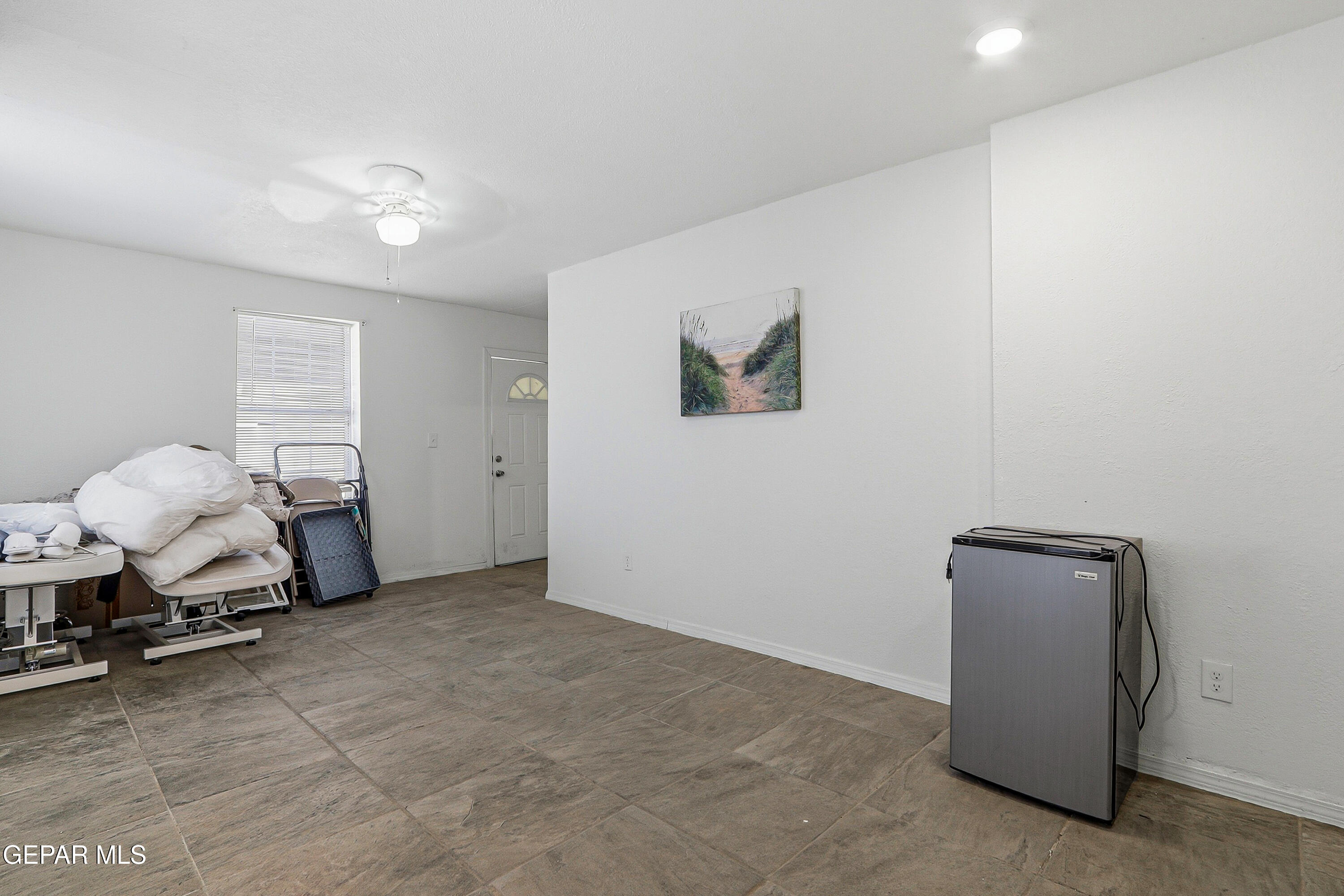11548 Jenny Road Socorro, TX 79927 - Photo 8 of 39 a view of a room with gym equipment
