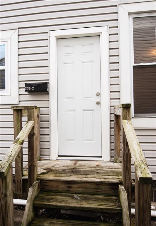 330 12th Avenue, Unit 2 New Brighton, PA 15066 - Photo 3 of 17 a view of house with wooden stairs
