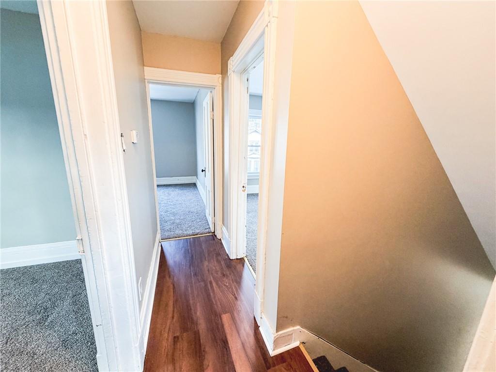 330 12th Avenue, Unit 2 New Brighton, PA 15066 - Photo 8 of 17 a view of a hallway with wooden floor