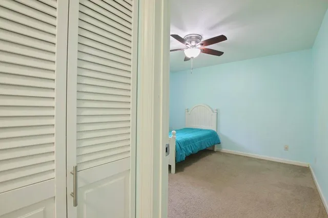 a view of a room with a fan