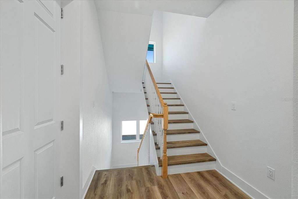 15405 Gulf Boulevard, Unit B2 Madeira Beach, FL 33708 - Photo 17 of 49 a view of entryway and hall with wooden floor