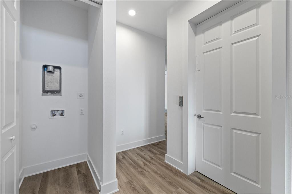 15405 Gulf Boulevard, Unit B2 Madeira Beach, FL 33708 - Photo 25 of 49 a view of room with wooden floor