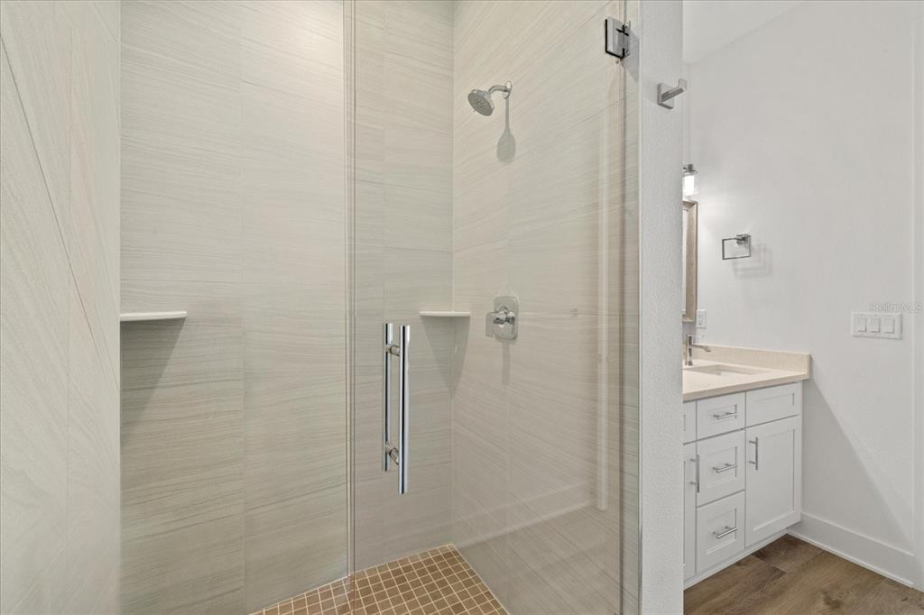 15405 Gulf Boulevard, Unit B2 Madeira Beach, FL 33708 - Photo 27 of 49 a bathroom with a shower