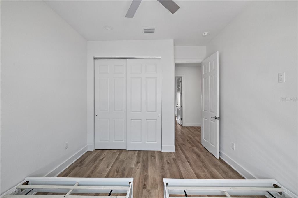 15405 Gulf Boulevard, Unit B2 Madeira Beach, FL 33708 - Photo 33 of 49 a view of kitchen space with wooden floor