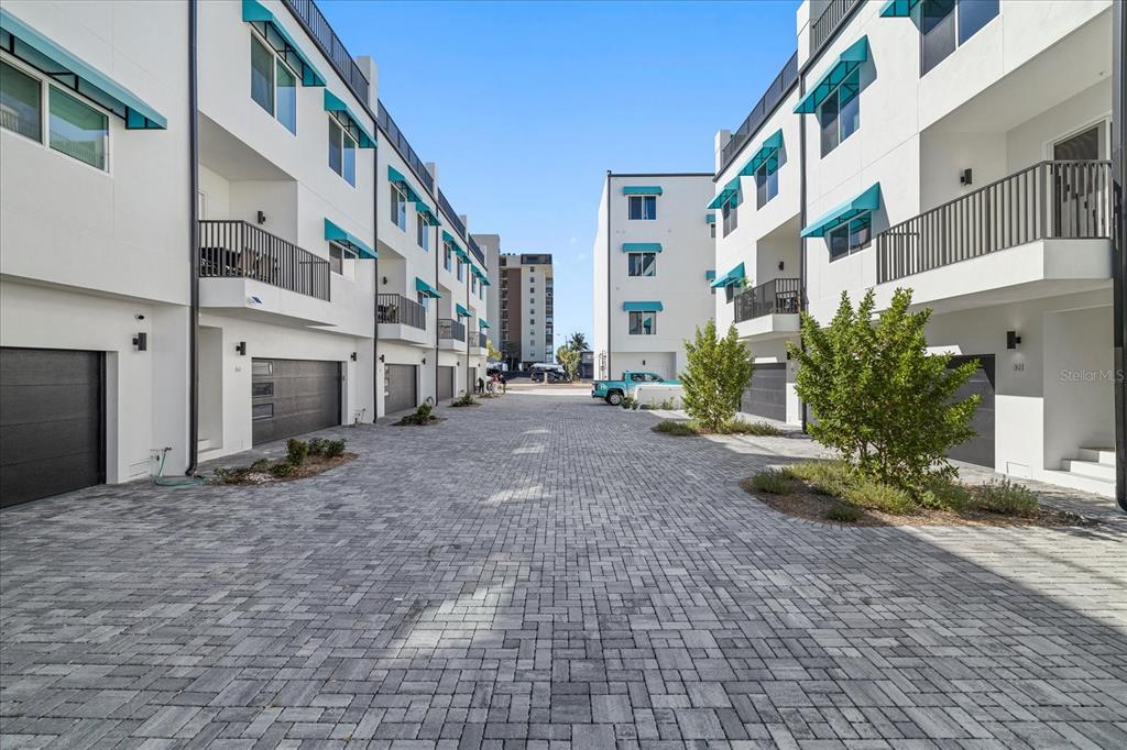 15405 Gulf Boulevard, Unit B2 Madeira Beach, FL 33708 - Photo 4 of 49 a view of a house with a yard