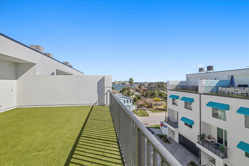 15405 Gulf Boulevard, Unit B2 Madeira Beach, FL 33708 - Photo 47 of 49 a view of balcony with furniture and city view