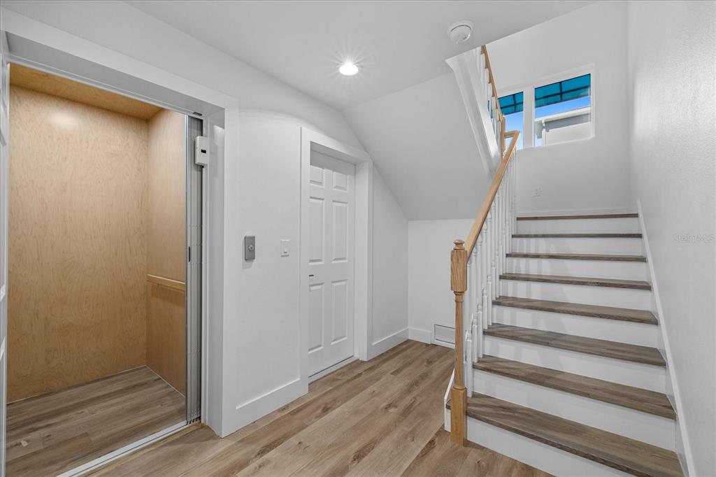 15405 Gulf Boulevard, Unit B2 Madeira Beach, FL 33708 - Photo 7 of 49 a view of entryway with wooden floor