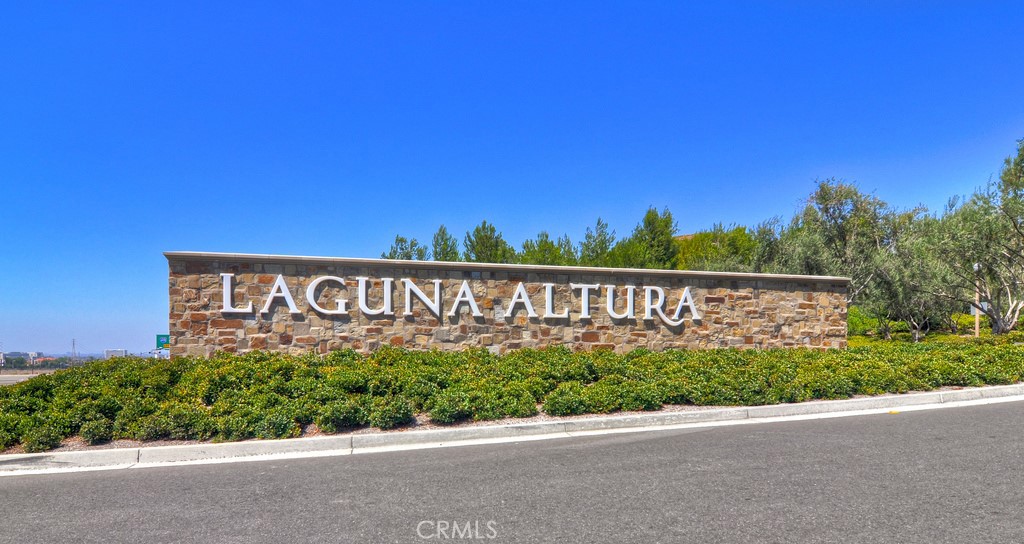 61 Lupari Irvine, CA 92618 - Photo 32 of 65 a street sign that is on a pole