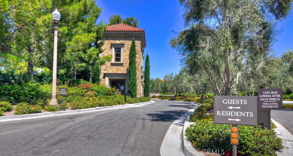 61 Lupari Irvine, CA 92618 - Photo 33 of 65 a sign board with a house and garden space