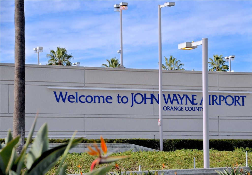 61 Lupari Irvine, CA 92618 - Photo 64 of 65 a street sign that is on a pole