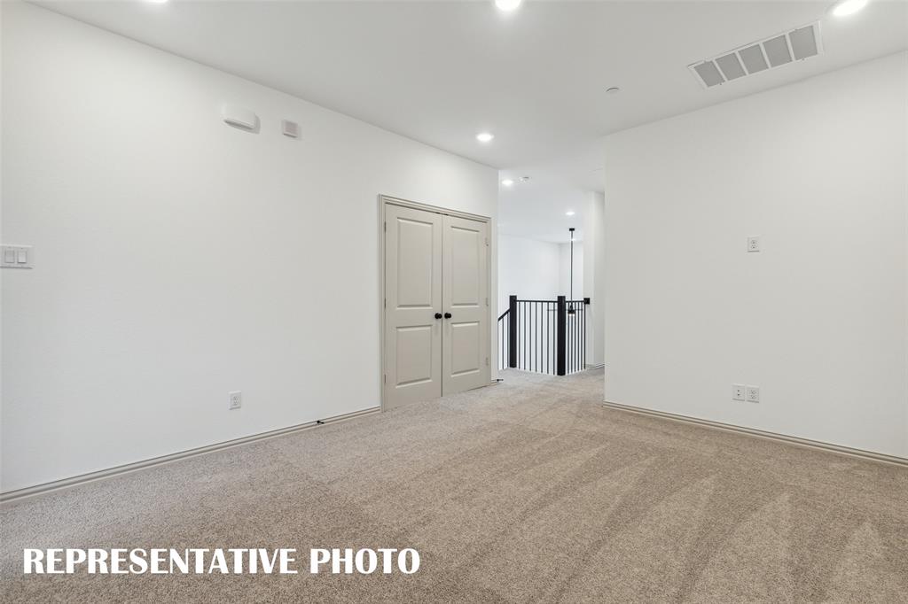 212 Dylan Way Midlothian, TX 76065 - Photo 9 of 16 The upstairs game room is the perfect place to enjoy some family fun time! REPRESENTATIVE PHOTO