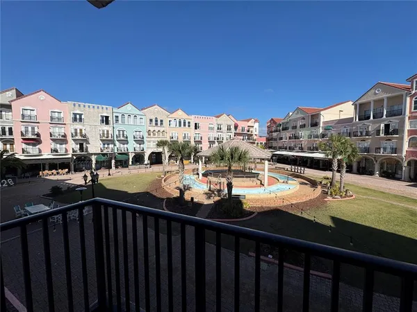 a view of a balcony with city view