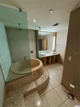 a bathroom with a sink a toilet and a bathtub