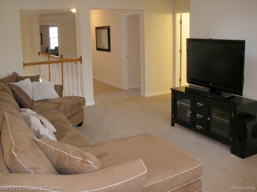 721 Timber Ridge Drive Highland, MI 48357 - Photo 19 of 25 Upper level lofted family room