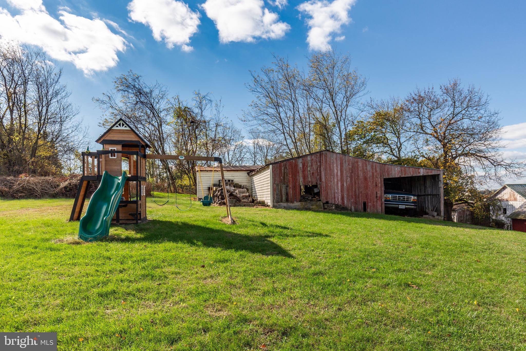 559 Sullivan Road Westminster, MD 21157 - Photo 12 of 37 Spacious backyard with new play area!