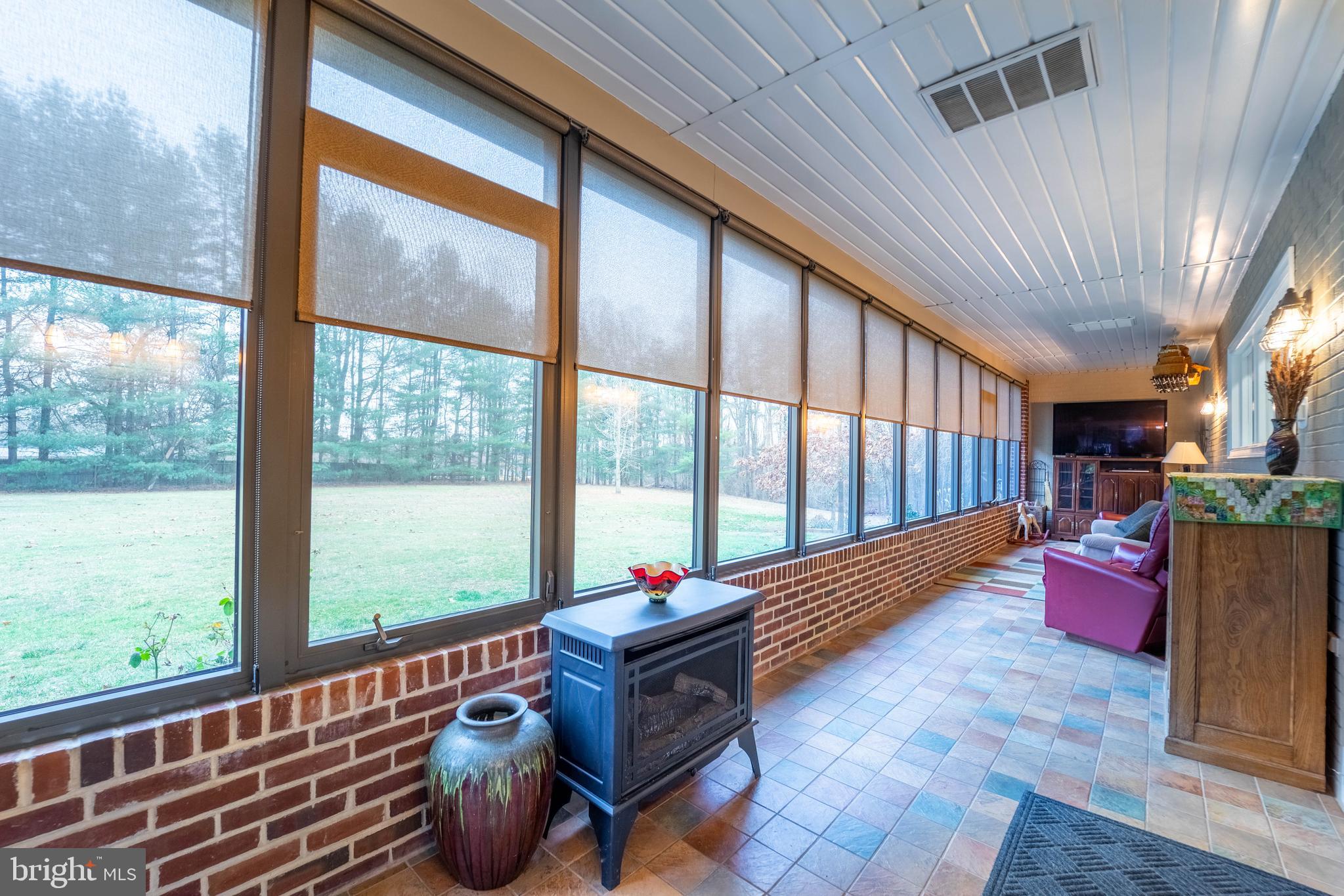 327 Crowl Road Westminster, MD 21158 - Photo 27 of 75 Heated/cooled sunroom overlooking the backyard