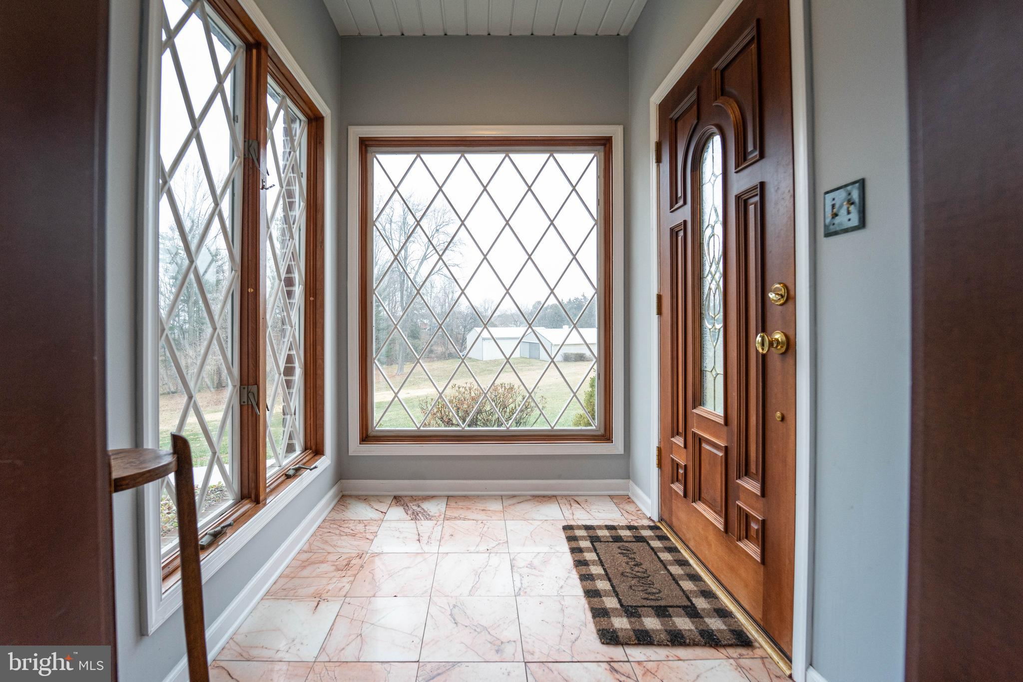 327 Crowl Road Westminster, MD 21158 - Photo 9 of 75 Sun-filled marble entryway