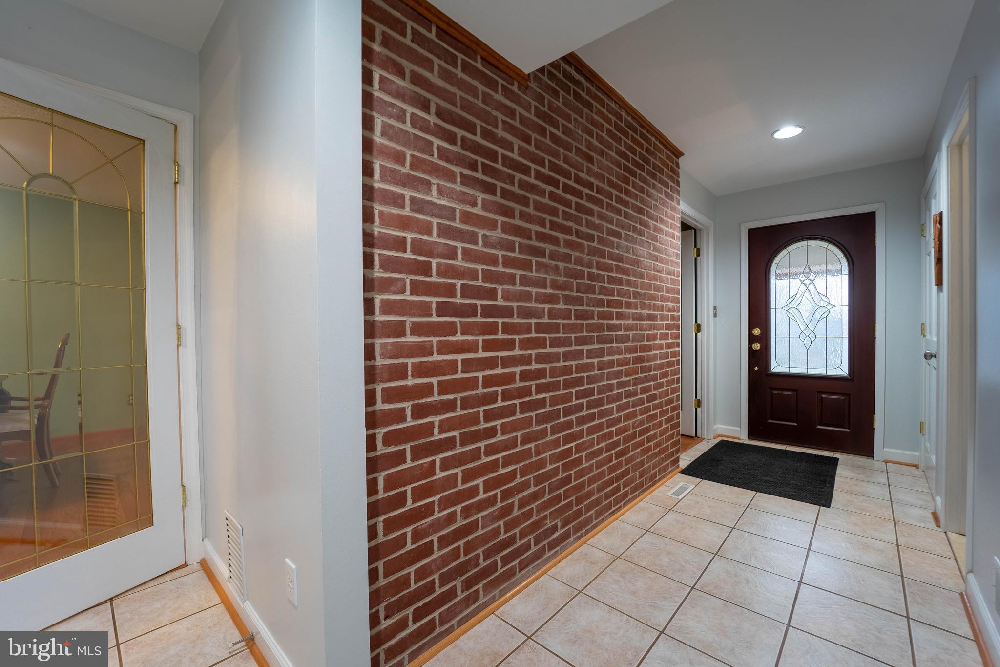 327 Crowl Road Westminster, MD 21158 - Photo 10 of 75 Foyer with Italian marble floors & exposed brick