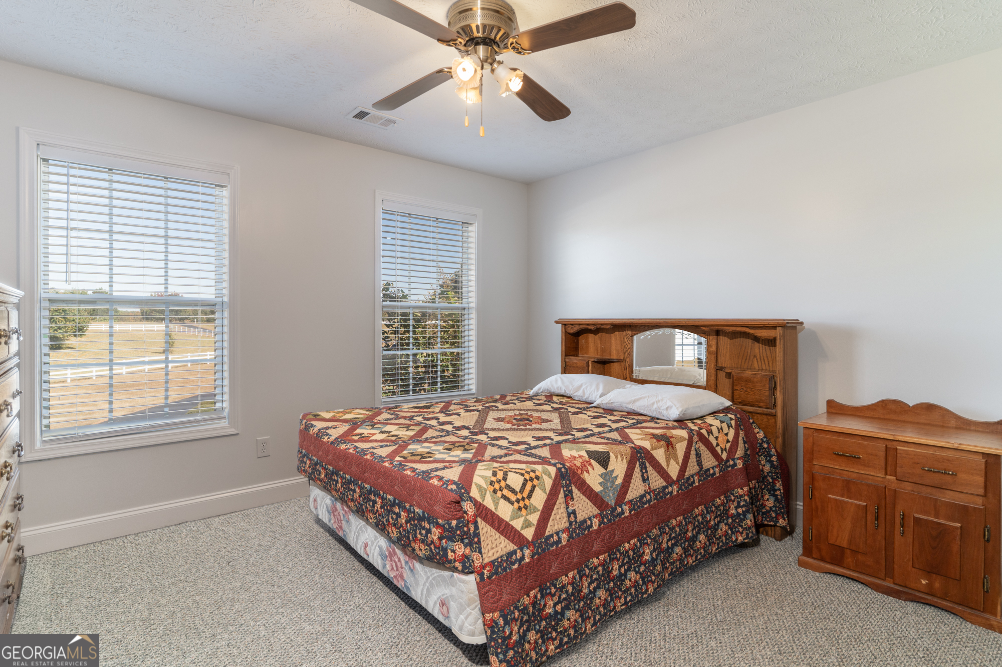 724 Teamon Road Griffin, GA 30223 - Photo 34 of 50 a bedroom with a bed and window