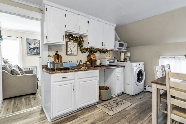 11 Cambridge Street Lawrence, MA 01843 - Photo 27 of 40 a kitchen with appliances a sink and a stove