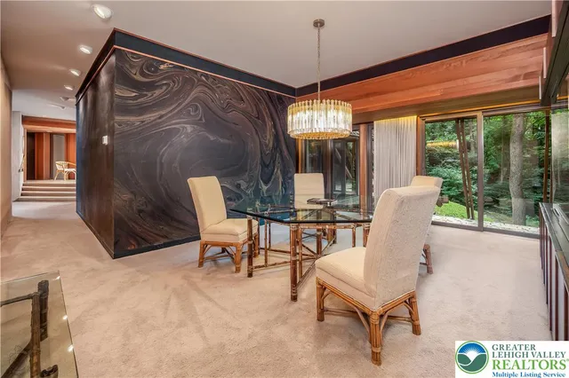 a view of an empty room with a balcony