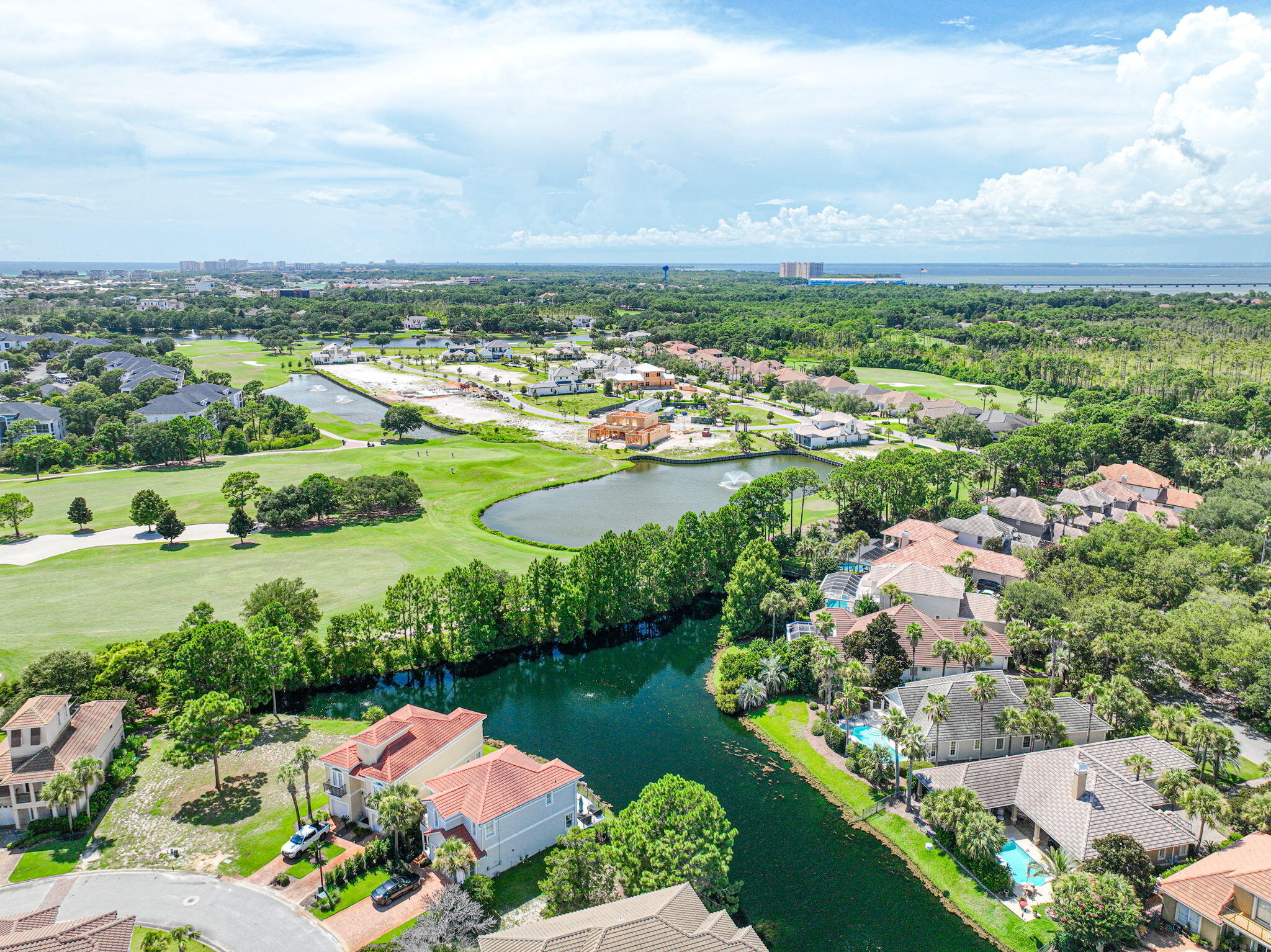 258 Calusa Boulevard Destin, FL 32541 - Photo 17 of 21 an aerial view of residential houses with outdoor space and lake view in back