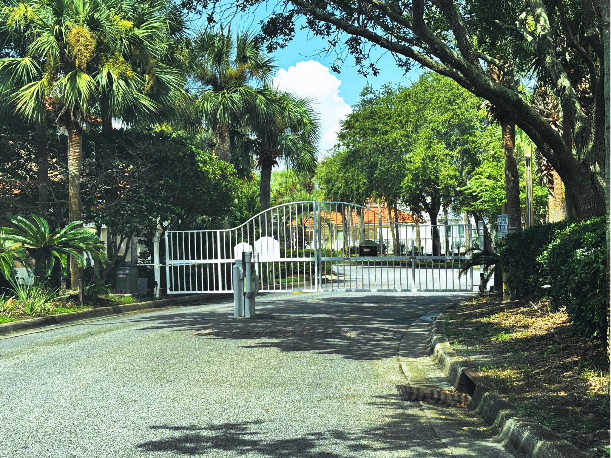 258 Calusa Boulevard Destin, FL 32541 - Photo 18 of 21 a garden view with a fountain