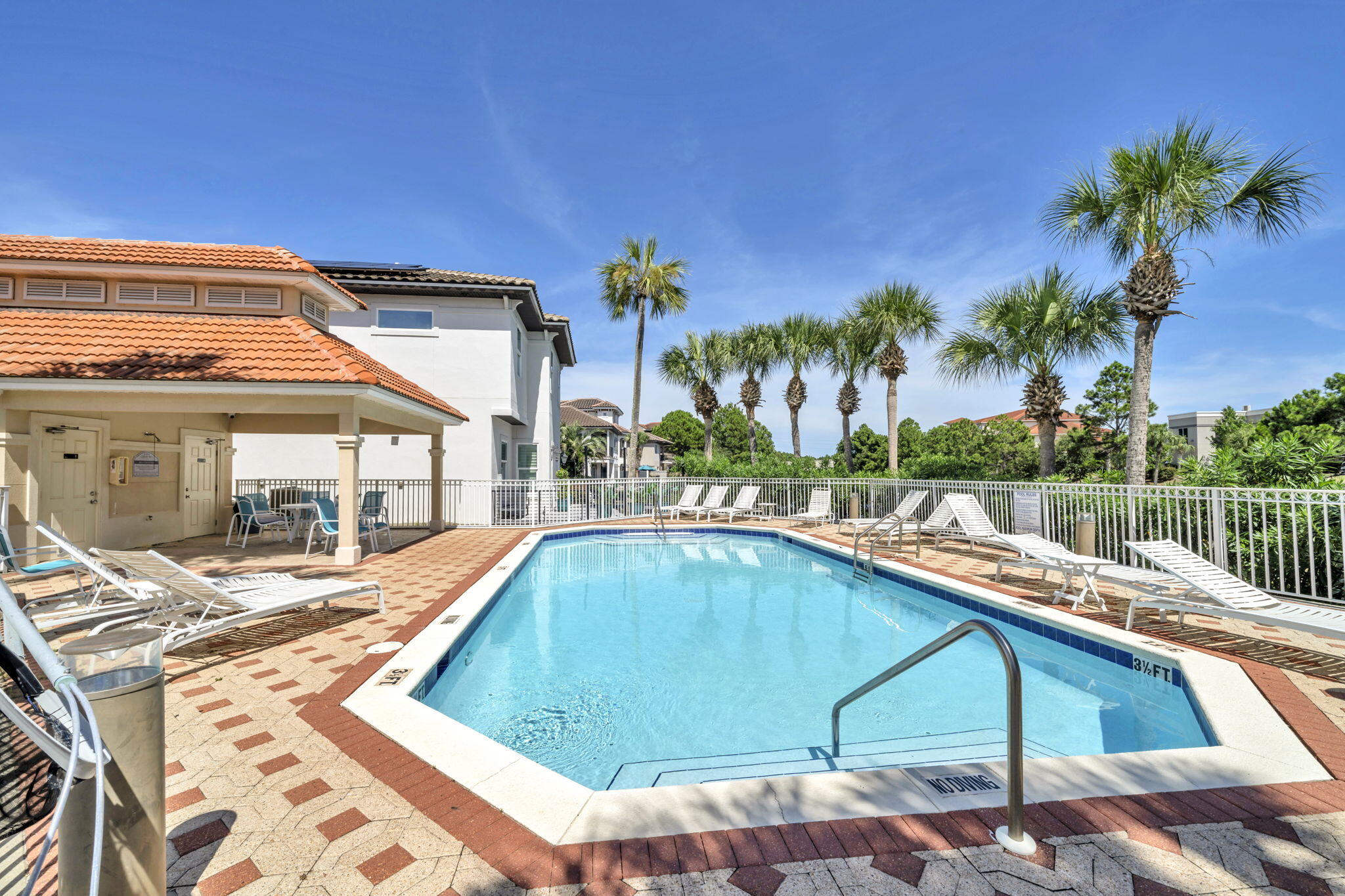 258 Calusa Boulevard Destin, FL 32541 - Photo 19 of 21 a view of a swimming pool with a patio