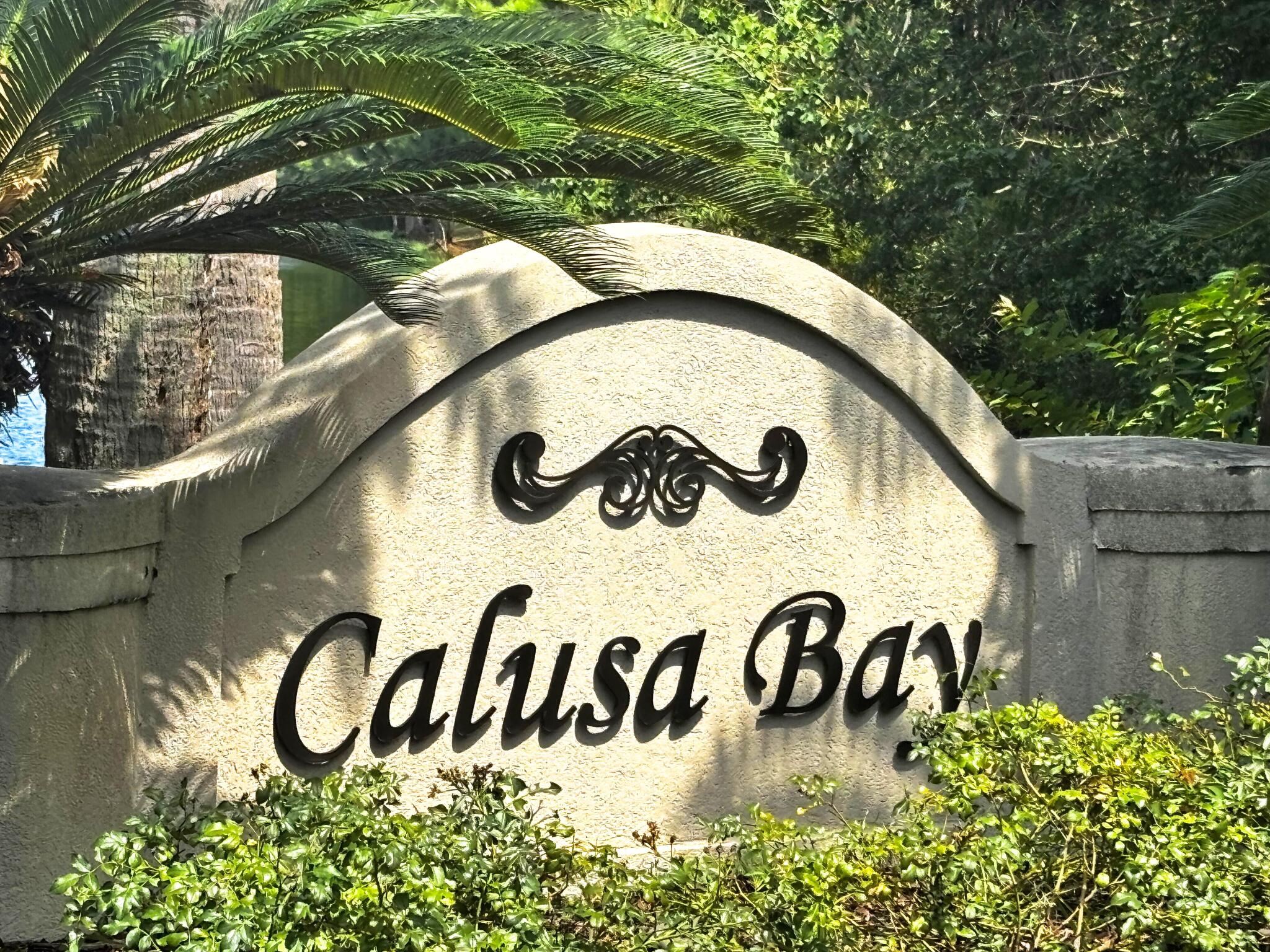 258 Calusa Boulevard Destin, FL 32541 - Photo 2 of 21 a sign that is on the side of a building