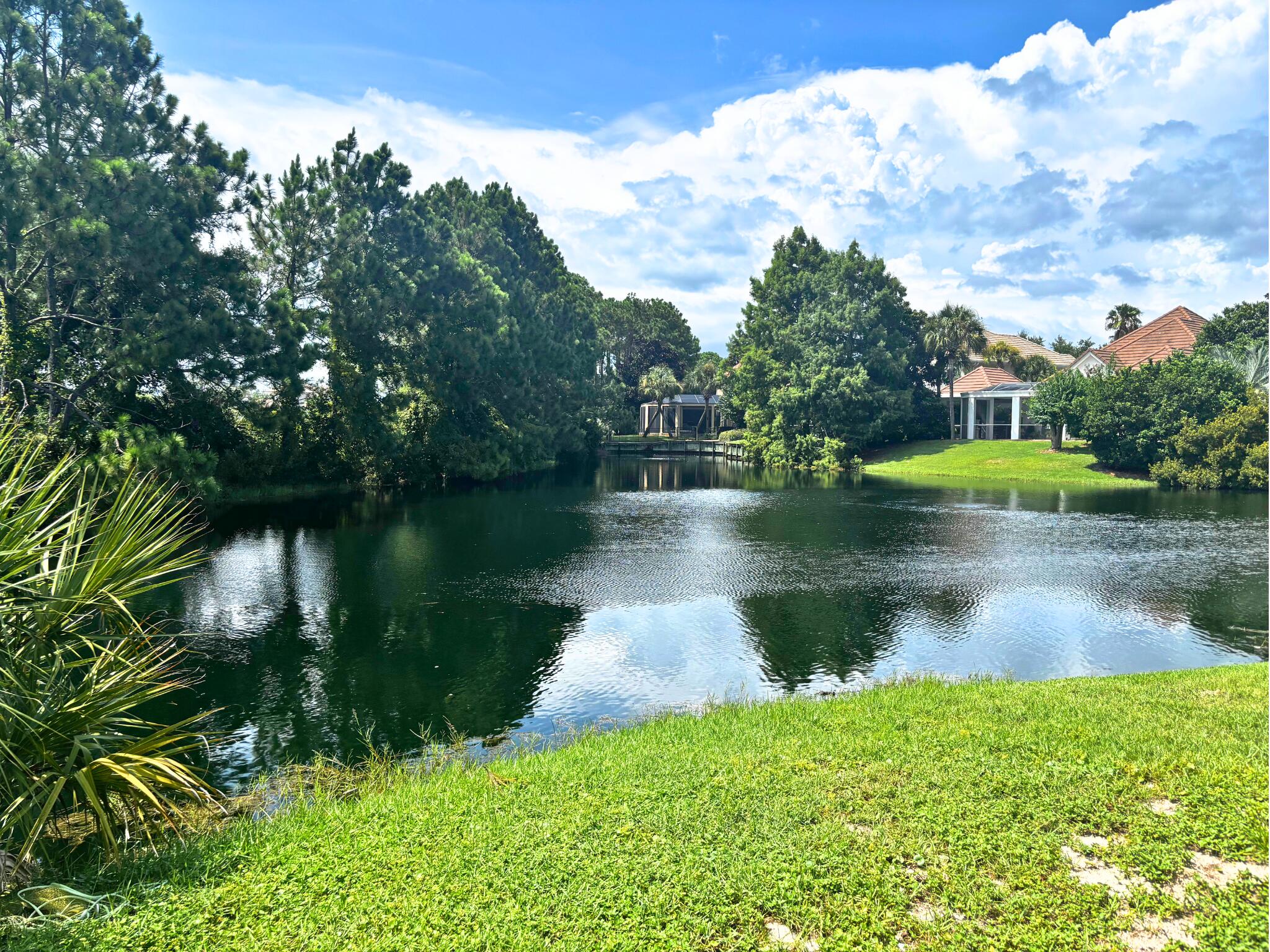 258 Calusa Boulevard Destin, FL 32541 - Photo 9 of 21 a view of a lake with a yard