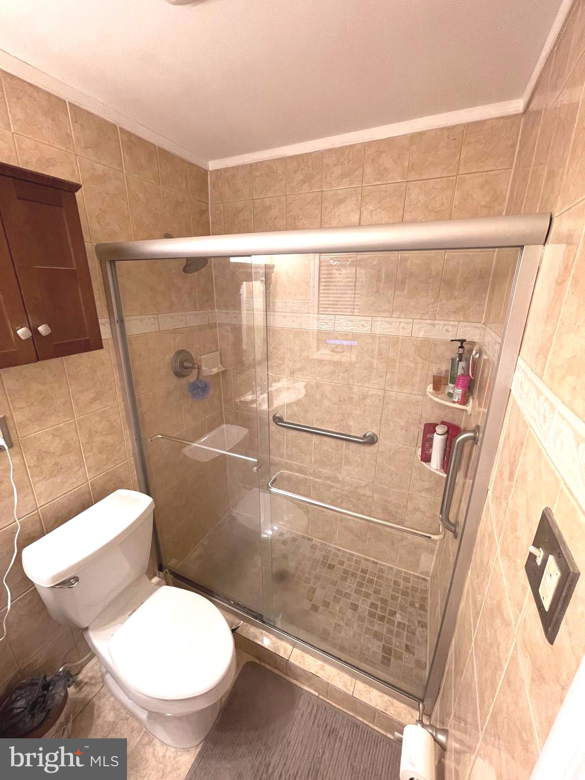 269 Golf Hills Road Havertown, PA 19083 - Photo 27 of 27 Lovely floor to ceiling tiles, modern bathroom