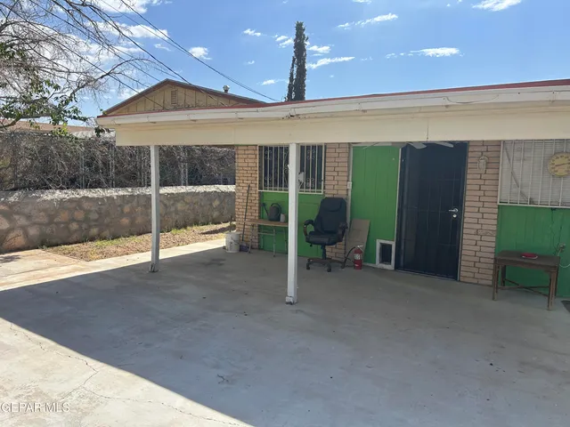 a view of a backyard of a house