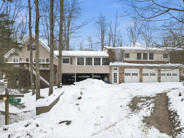 a view of a house with a snow