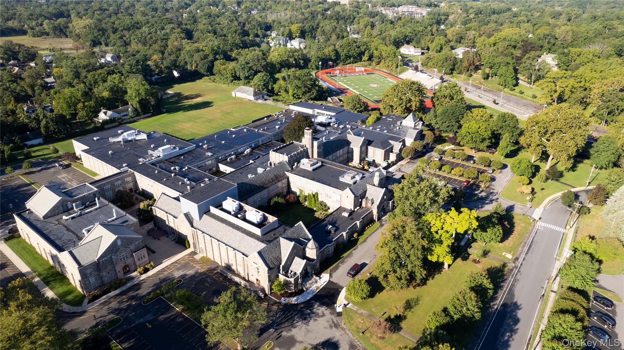 9 Walker Avenue Rye, NY 10580 - Photo 7 of 7 an aerial view of residential houses with outdoor space